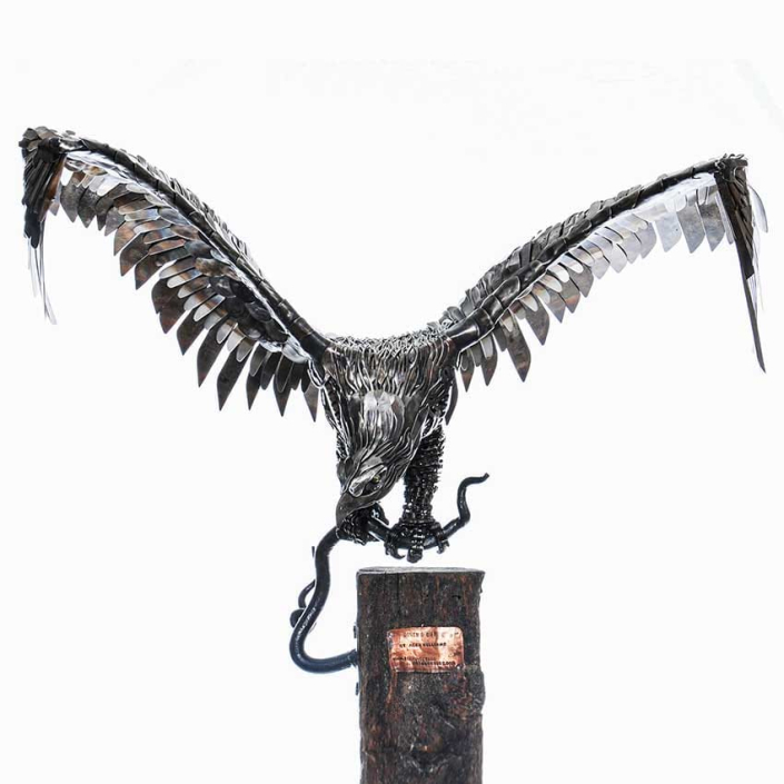 Dining Out - American Eagle reclaimed metal sculpture created by Alan Williams Metal Artist 2012
