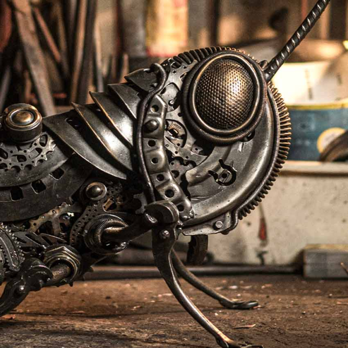 Grasshopper sculpture face details by artist Alan Williams