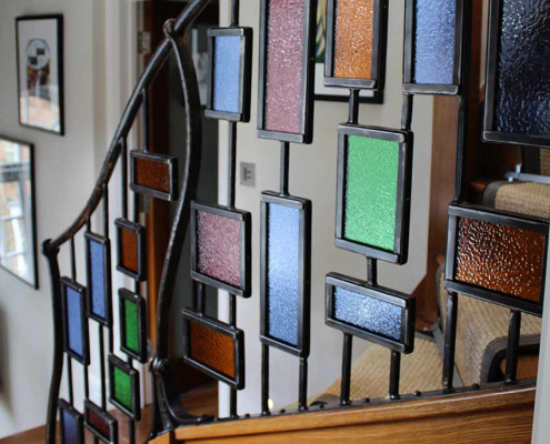 Glass and Metal Stair Handrail created by Alan Williams metal artist in 2015