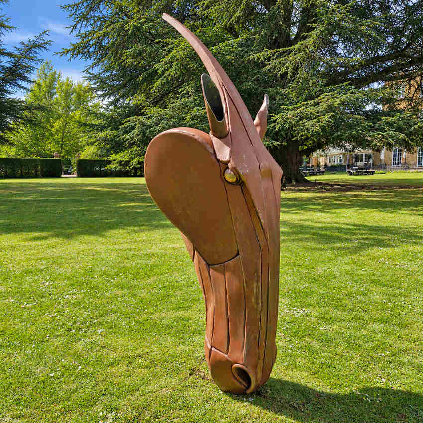 Fire Horse metal horse sculpture by Alan Williams, forged steel horse head outdoors