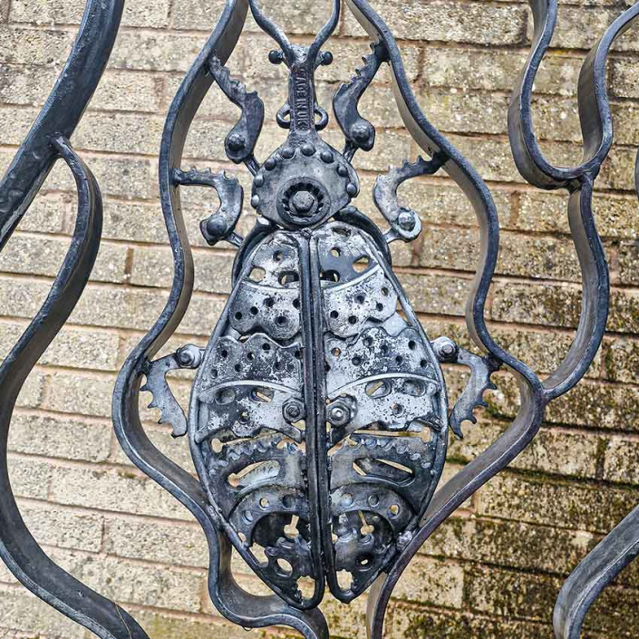 Bug Handrail Architectural garden sculpture created by Metal Sculpture Artist Alan Williams 2024