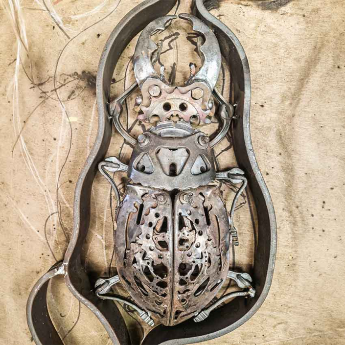 Bug Handrail Architectural garden sculpture created by Metal Sculpture Artist Alan Williams 2024